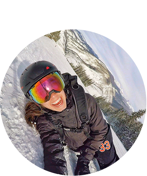 Woman smiling while skiing