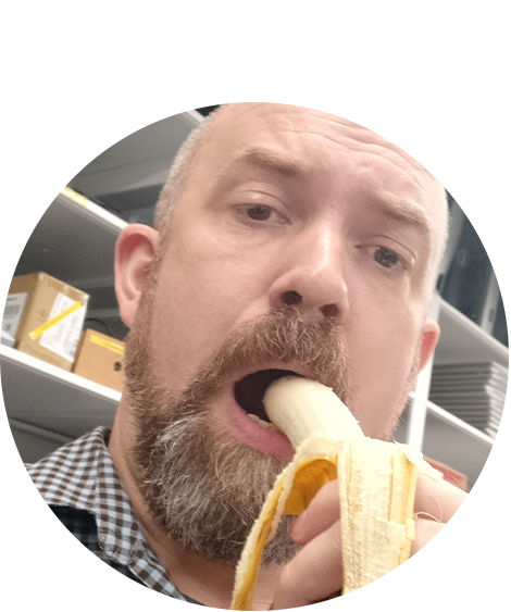 Man eating banana